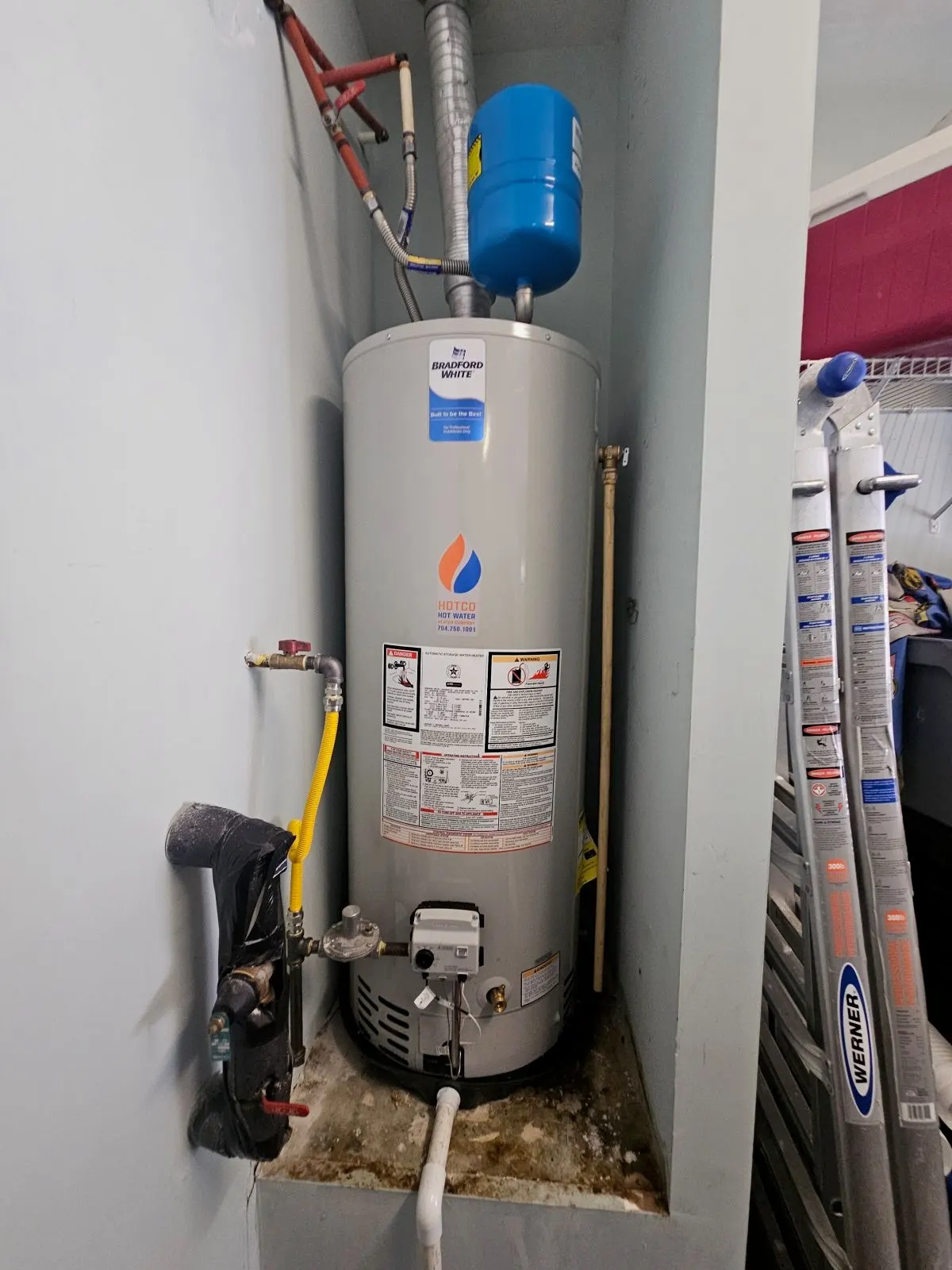 Gas tank water heater installed by HOTCO with expansion tank, seismic straps and code-compliant piping